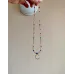 Halskette mit Zirkonia Perlen und Mond Anhänger