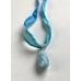 Larimar Anhänger an Stoffband in Blau