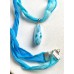 Larimar Anhänger an Stoffband in Blau
