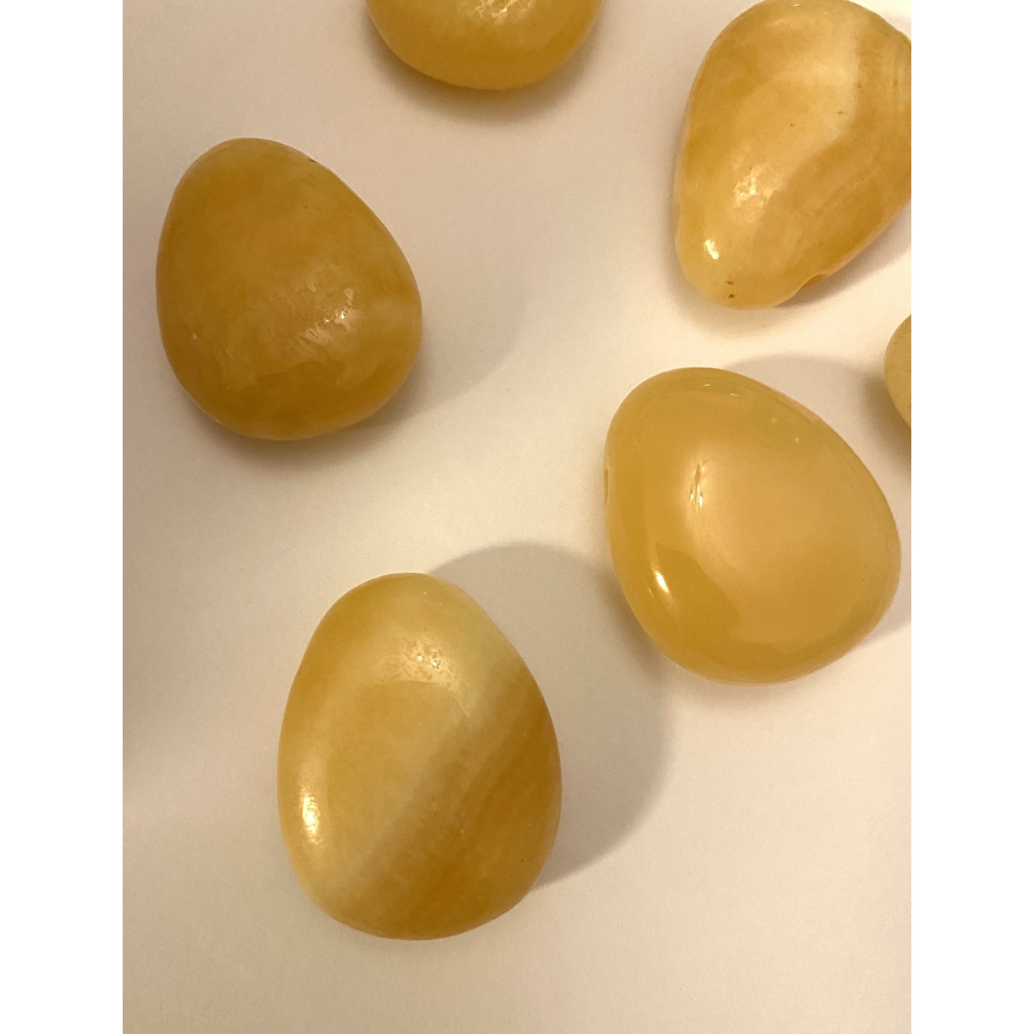 Calcit Gebohrter Trommelstein