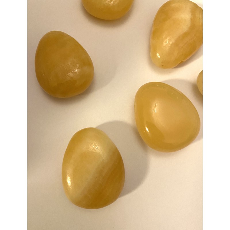 Calcit Gebohrter Trommelstein